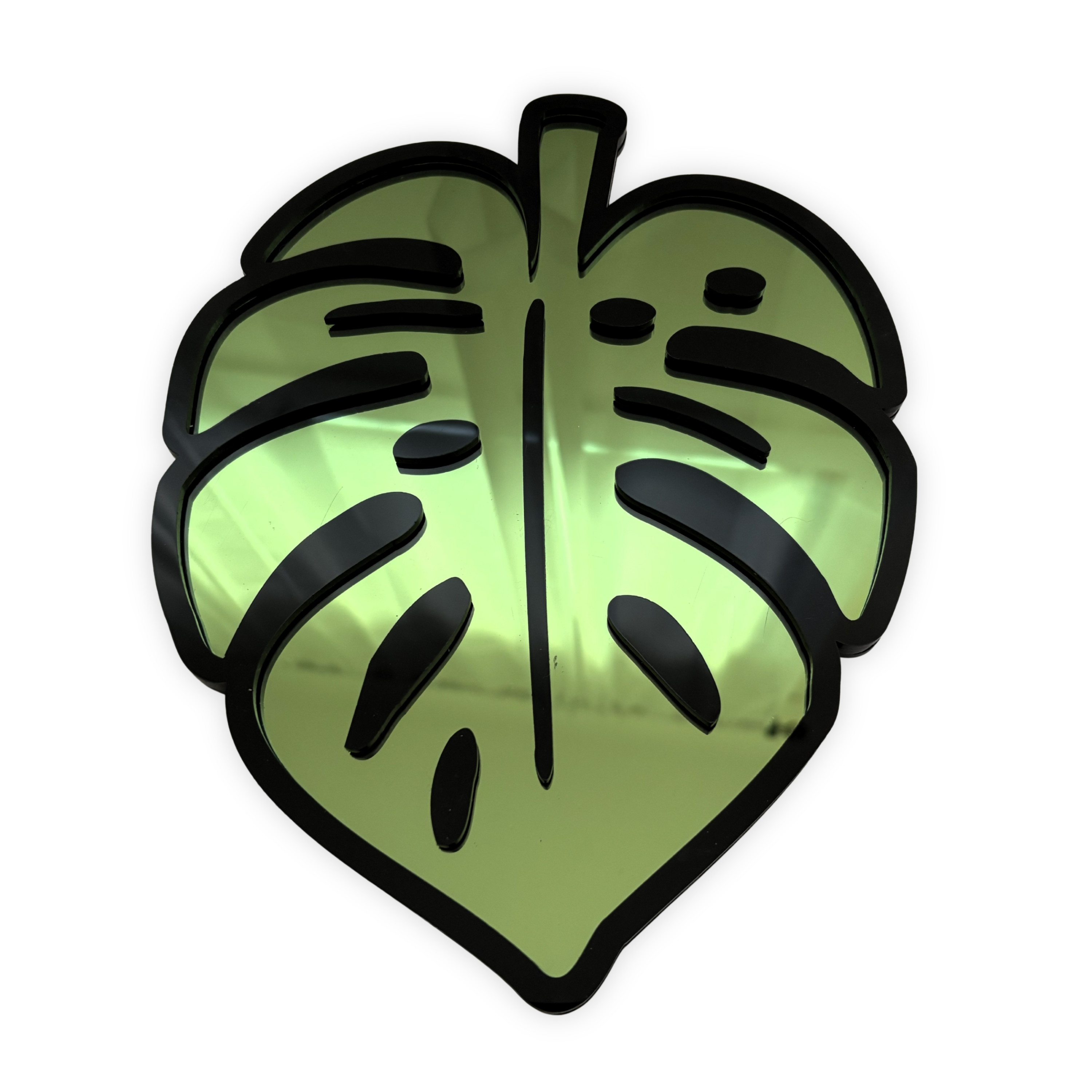 Green leaf-shaped object with black outline on a white background