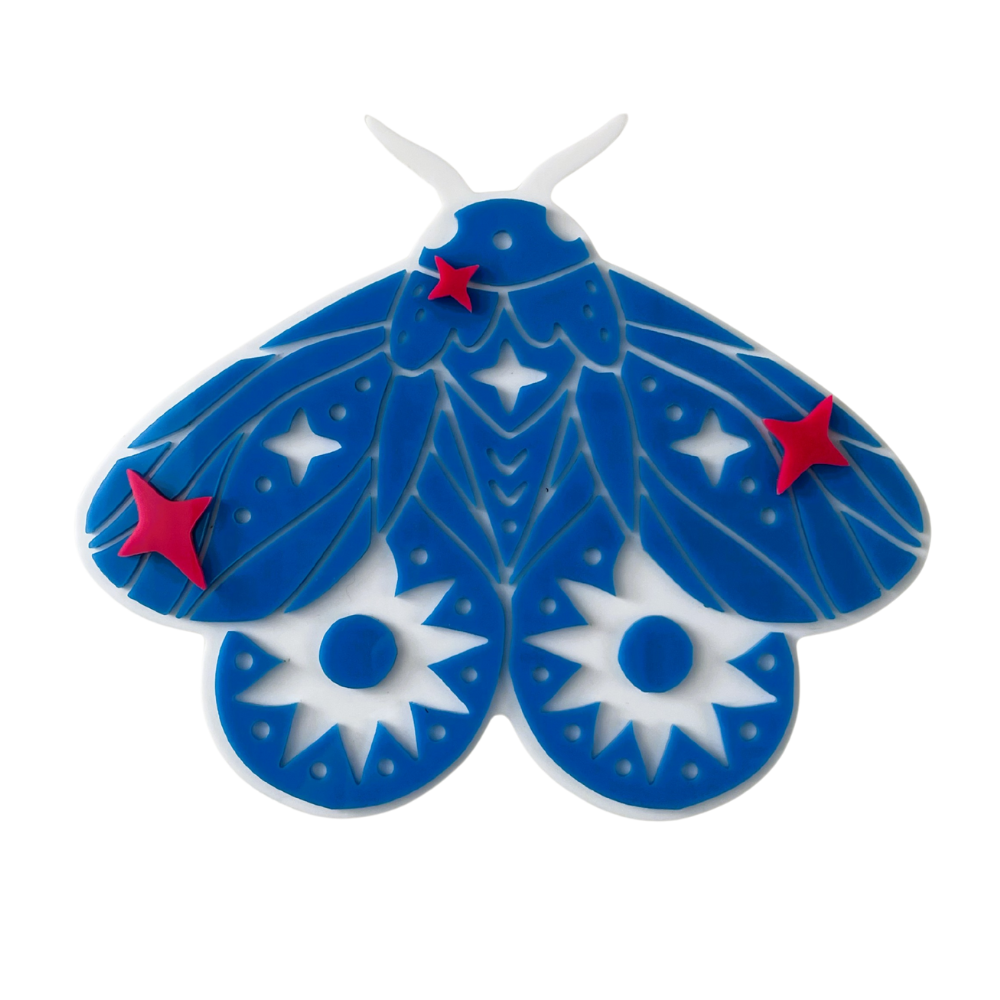 Blue and white decorative moth with red accents on a white background