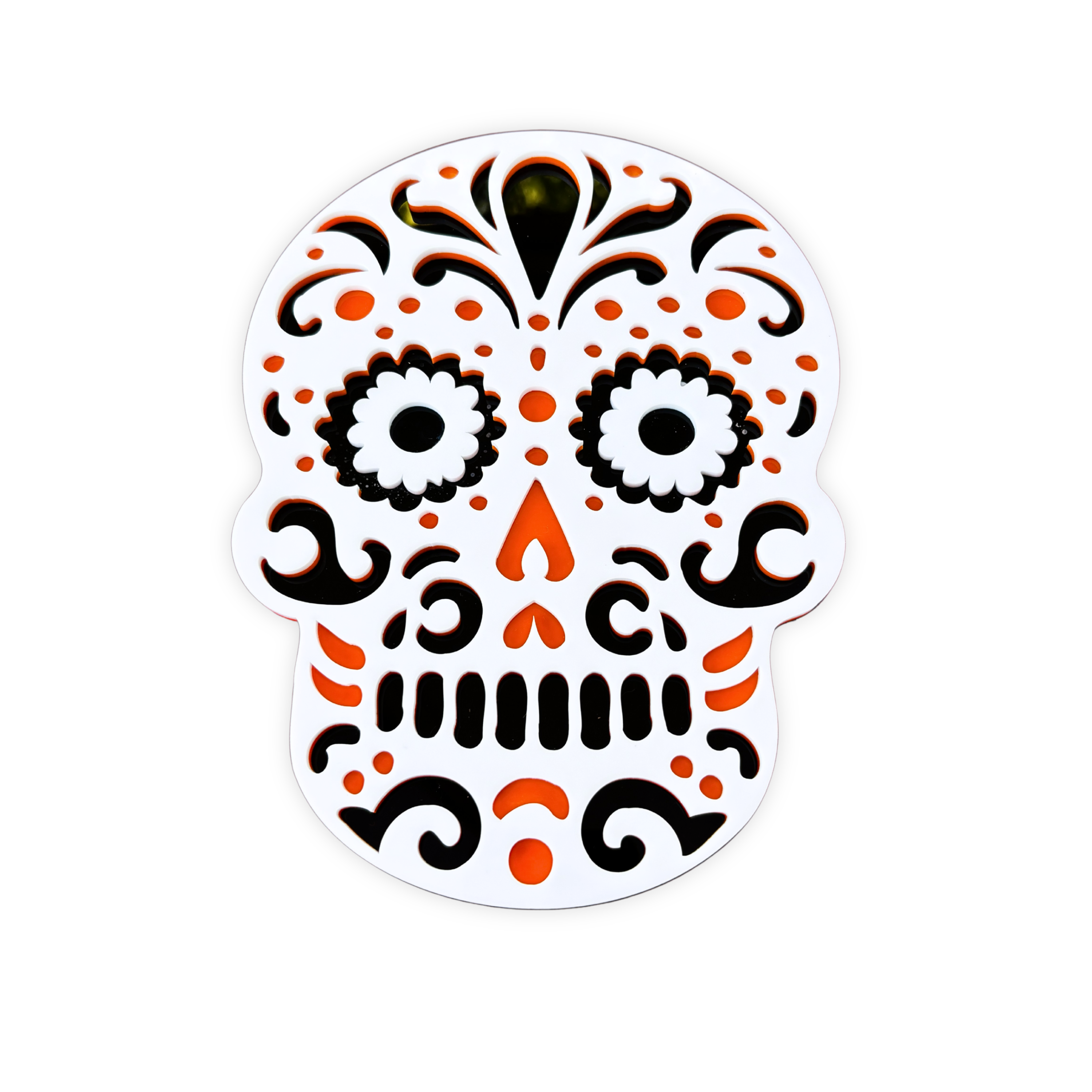 Decorative skull design with black, orange, and white colors on a white background